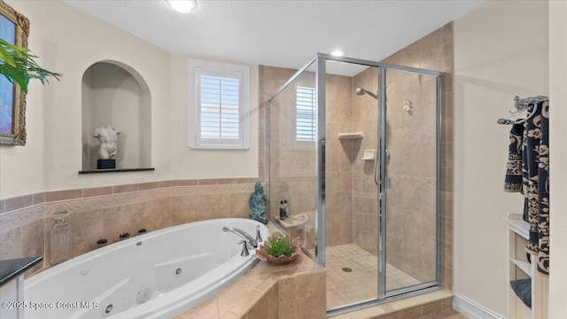 480 Sail Ln Unit 607, Merritt Island, FL 32953 - bathroom featuring a shower stall and a jetted tub