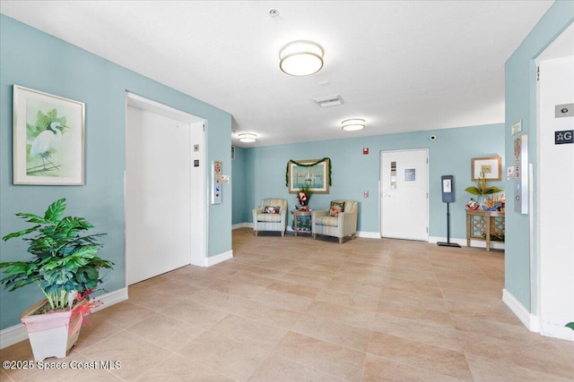 480 Sail Ln Unit 607, Merritt Island, FL 32953 - foyer featuring baseboards and light tile patterned floors