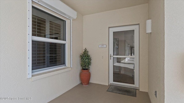 480 Sail Ln Unit 607, Merritt Island, FL 32953 - property entrance featuring stucco siding