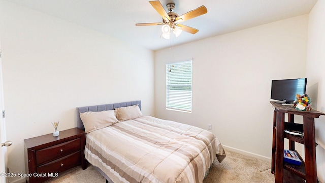 1491 Higbee St SE, Palm Bay, FL 32909 - carpeted bedroom featuring baseboards and ceiling fan