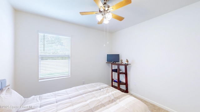 1491 Higbee St SE, Palm Bay, FL 32909 - carpeted bedroom with baseboards and ceiling fan