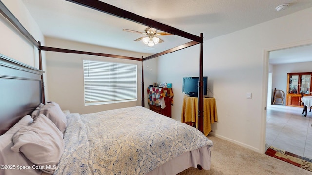 1491 Higbee St SE, Palm Bay, FL 32909 - bedroom with light carpet, ceiling fan, and baseboards