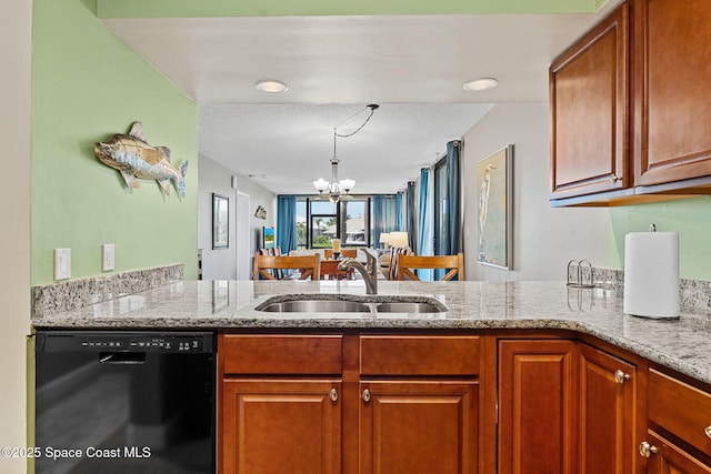 300 Columbia Dr Unit 108-2, Cape Canaveral, FL 32920 - kitchen with dishwasher, a sink, a chandelier, a peninsula, and light stone counters