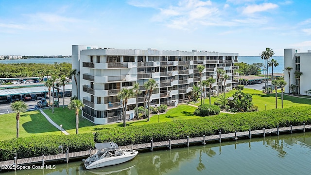 300 Columbia Dr Unit 108-2, Cape Canaveral, FL 32920 - view of apartment building / complex with a water view