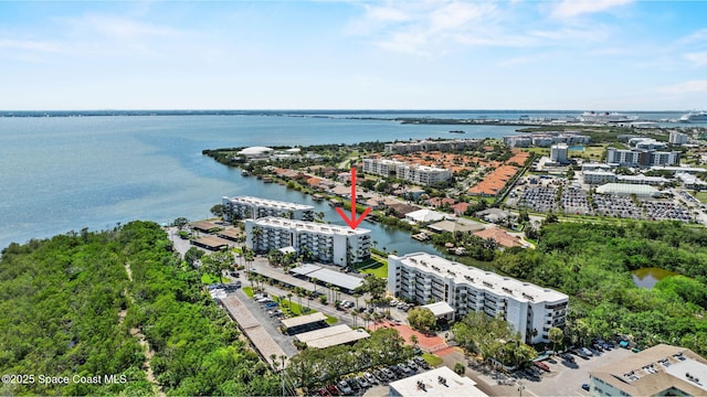 300 Columbia Dr Unit 108-2, Cape Canaveral, FL 32920 - bird's eye view of apartment complex and a large body of water
