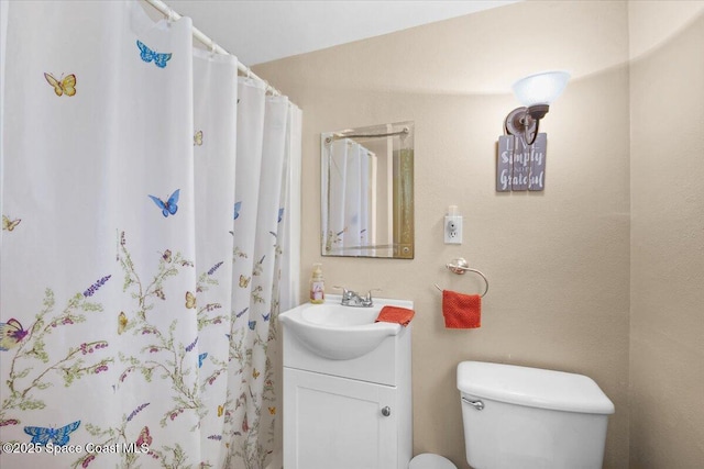 965 Bluegrass Ln, Rockledge, FL 32955 - full bath with vanity, toilet, and a shower with shower curtain