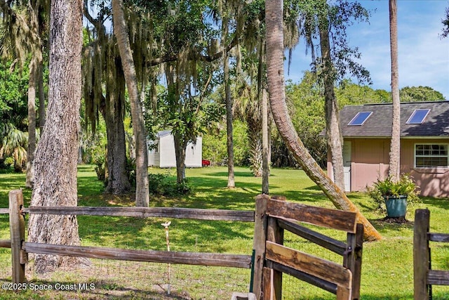 965 Bluegrass Ln, Rockledge, FL 32955 - view of yard with an outbuilding