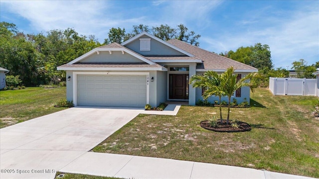 1041 Tupelo Cir, Cocoa, FL 32926 - view of front facade with an attached garage, stucco siding, concrete driveway, and a shingled roof