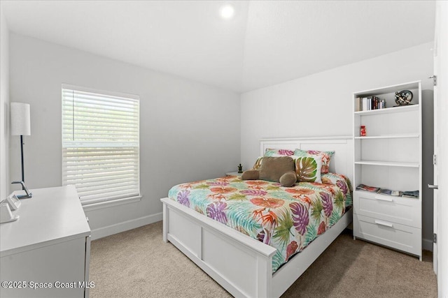 1041 Tupelo Cir, Cocoa, FL 32926 - bedroom with light colored carpet, baseboards, and vaulted ceiling