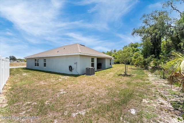 1041 Tupelo Cir, Cocoa, FL 32926 - view of side of home with central AC unit
