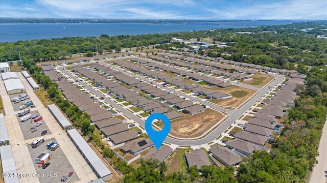 1041 Tupelo Cir, Cocoa, FL 32926 - aerial view of residential area with a large body of water