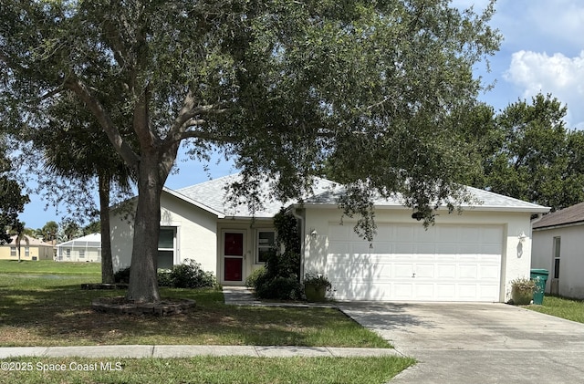499 Benton Dr, Melbourne, FL 32901 - single story home with driveway, stucco siding, an attached garage, and a front lawn