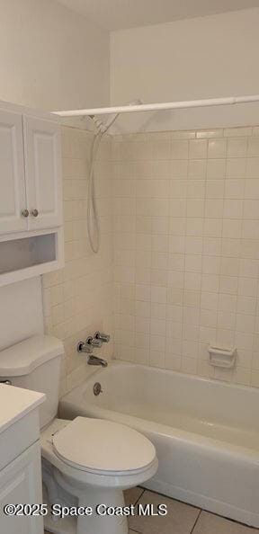 55 Needle Blvd Unit 76, Merritt Island, FL 32953 - full bath with toilet, vanity, shower / bath combination, and tile patterned flooring