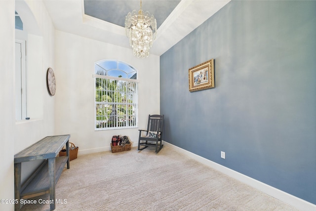 1737 Windbrook Dr SE, Palm Bay, FL 32909 - living area with a chandelier, carpet floors, baseboards, and a raised ceiling