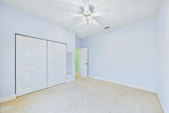 1737 Windbrook Dr SE, Palm Bay, FL 32909 - unfurnished bedroom featuring carpet, a closet, and baseboards
