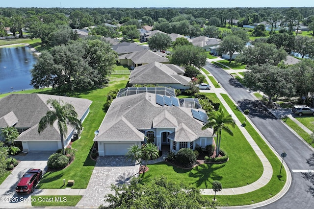 1737 Windbrook Dr SE, Palm Bay, FL 32909 - aerial view of residential area with a nearby body of water