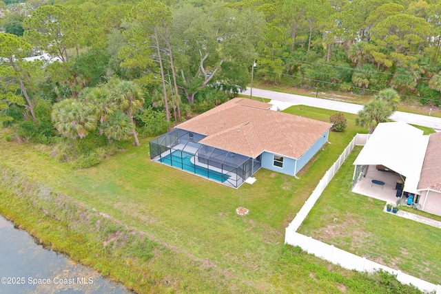 766 Tooley Rd SW, Palm Bay, FL 32908 - aerial view of property and surrounding area featuring a pool area and a heavily wooded area