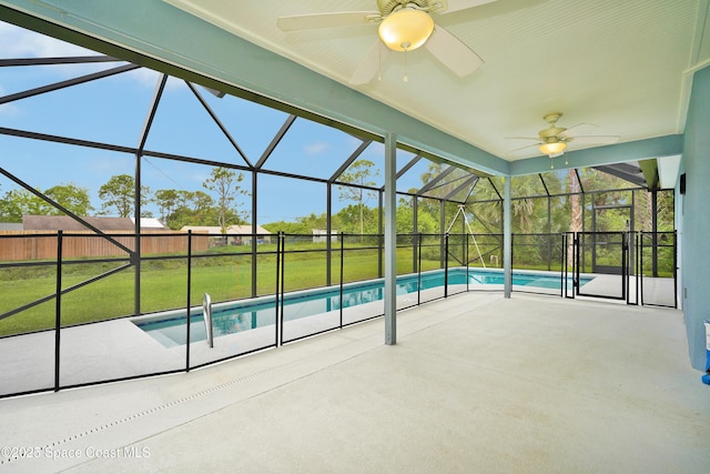 766 Tooley Rd SW, Palm Bay, FL 32908 - view of swimming pool featuring ceiling fan, a patio, and a lanai