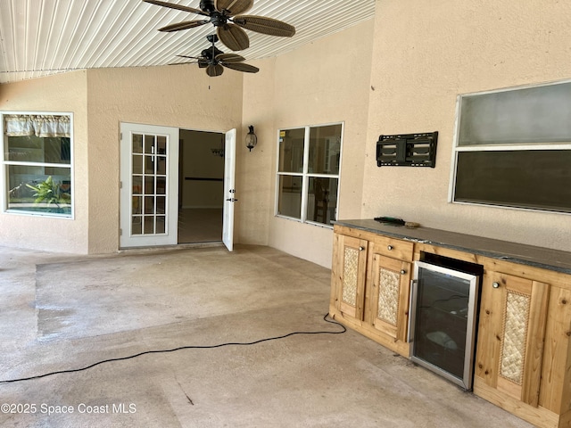 845 Hunters Creek Dr, Melbourne, FL 32904 - view of patio with a ceiling fan and wine cooler