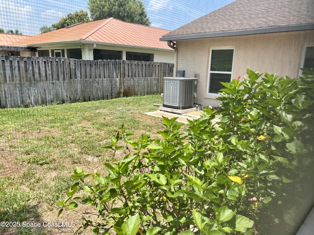 845 Hunters Creek Dr, Melbourne, FL 32904 - view of yard featuring central AC