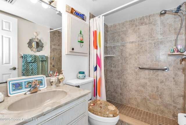 5800 N Banana River Blvd Unit 125, Cape Canaveral, FL 32920 - full bathroom featuring a tile shower, vanity, and toilet