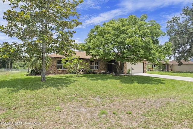 1401 Ruffin Cir SE, Palm Bay, FL 32909 - view of front of property featuring concrete driveway, a front yard, and an attached garage