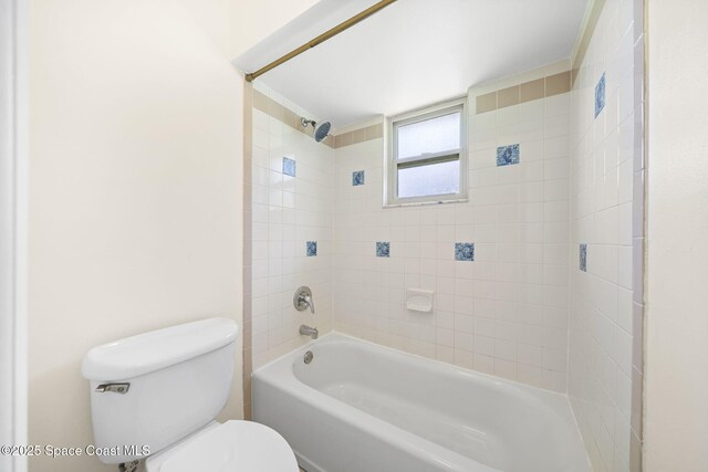 1401 Ruffin Cir SE, Palm Bay, FL 32909 - bathroom featuring toilet and shower / tub combination