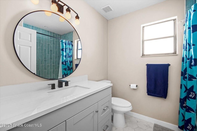 1709 Palm Ridge Rd, Melbourne, FL 32935 - bathroom featuring baseboards, healthy amount of natural light, vanity, and toilet