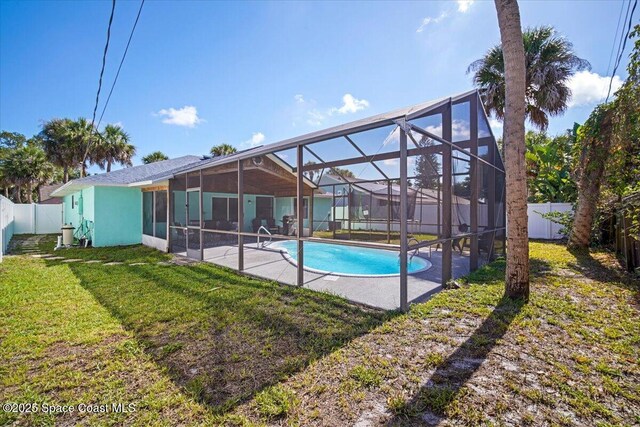 1709 Palm Ridge Rd, Melbourne, FL 32935 - view of swimming pool featuring a patio area and a lanai