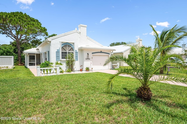 1924 Elderberry Ct NE, Palm Bay, FL 32905 - view of front of house featuring an attached garage, stucco siding, a front yard, driveway, and a sunroom