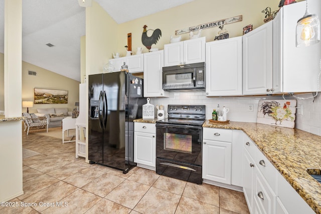 1924 Elderberry Ct NE, Palm Bay, FL 32905 - kitchen featuring black appliances, backsplash, white cabinets, vaulted ceiling, and light stone counters