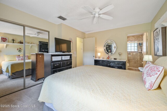 1924 Elderberry Ct NE, Palm Bay, FL 32905 - carpeted bedroom with a closet, a textured ceiling, and ceiling fan