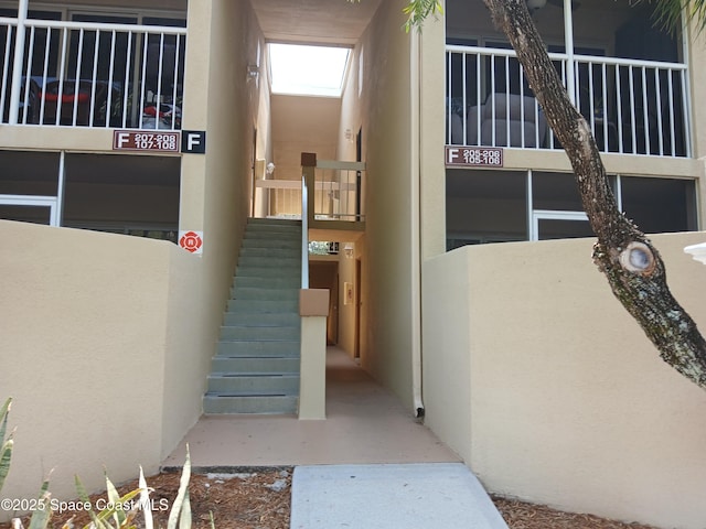 1600 Sunny Brook Ln NE Unit F108, Palm Bay, FL 32905 - entrance to property with stucco siding