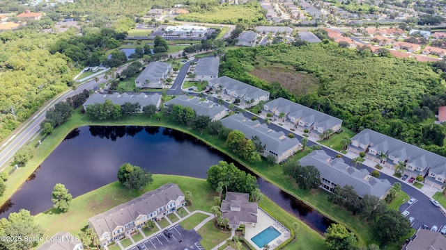 601 Trotter Ln Unit 102, Melbourne, FL 32940 - aerial view of property's location with a nearby body of water and nearby suburban area