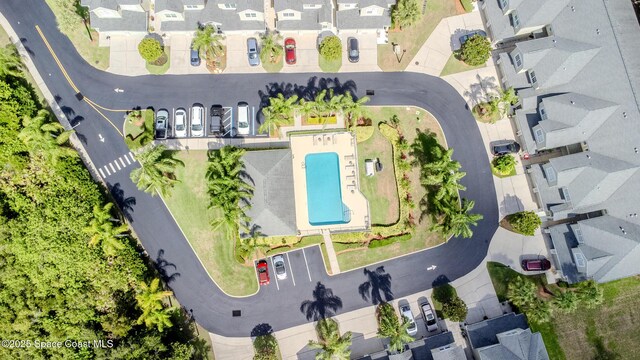601 Trotter Ln Unit 102, Melbourne, FL 32940 - aerial perspective of suburban area featuring a pool