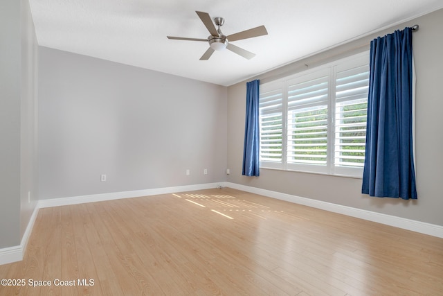 601 Trotter Ln Unit 102, Melbourne, FL 32940 - unfurnished room featuring light wood-style flooring, baseboards, and ceiling fan