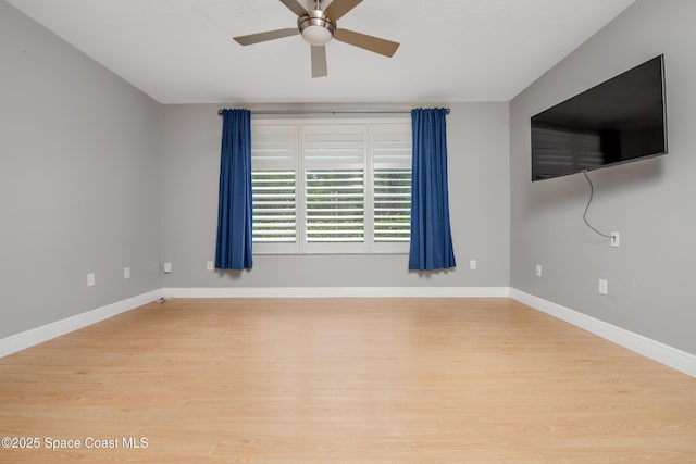 601 Trotter Ln Unit 102, Melbourne, FL 32940 - spare room with a ceiling fan, light wood-style flooring, and baseboards