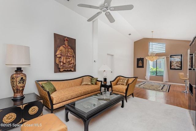 1444 Patriot Dr, Melbourne, FL 32940 - living room with ceiling fan, high vaulted ceiling, wood finished floors, and baseboards