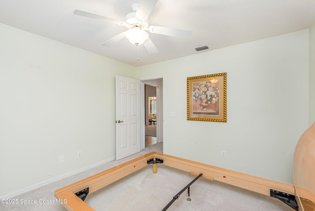 1444 Patriot Dr, Melbourne, FL 32940 - workout area featuring carpet, a ceiling fan, and baseboards