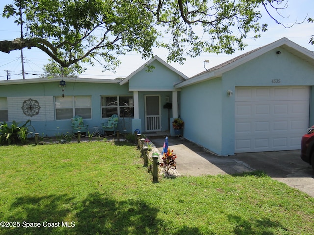 4535 Moon Rd, Titusville, FL 32780 - single story home with a front yard, stucco siding, a garage, and concrete driveway