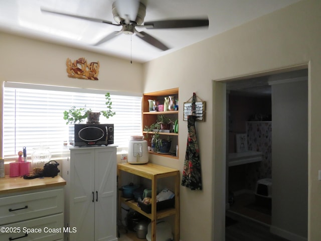 4535 Moon Rd, Titusville, FL 32780 - office area featuring a ceiling fan