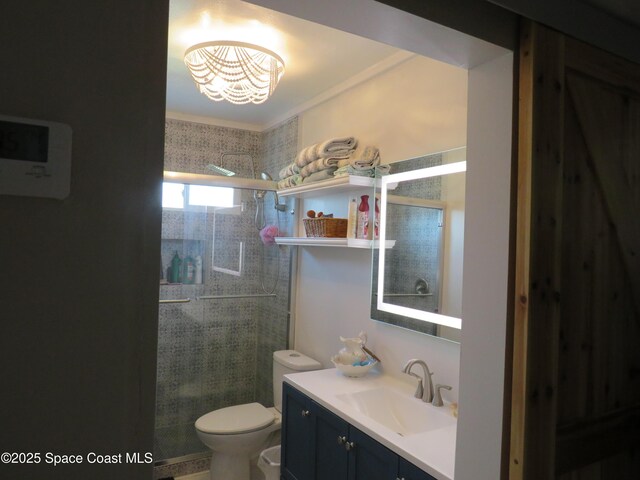 4535 Moon Rd, Titusville, FL 32780 - full bath featuring a shower stall, toilet, vanity, and a chandelier