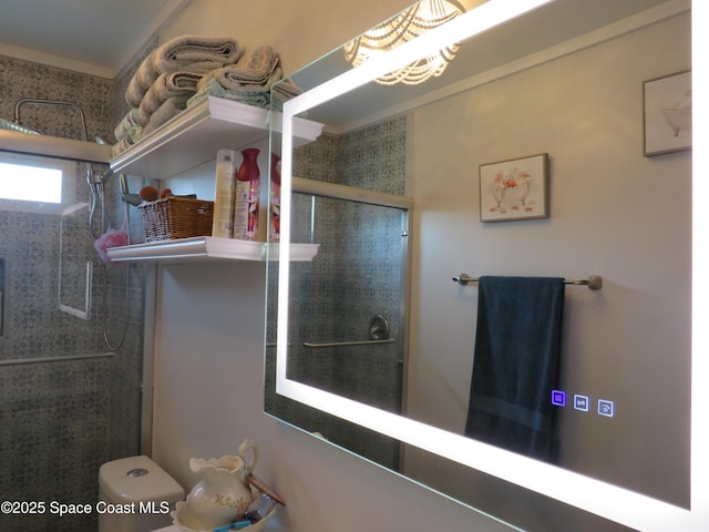 4535 Moon Rd, Titusville, FL 32780 - full bathroom with a tile shower, toilet, and a chandelier