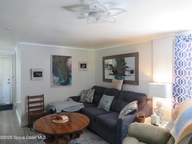 4535 Moon Rd, Titusville, FL 32780 - living area featuring wood finished floors, a ceiling fan, and crown molding