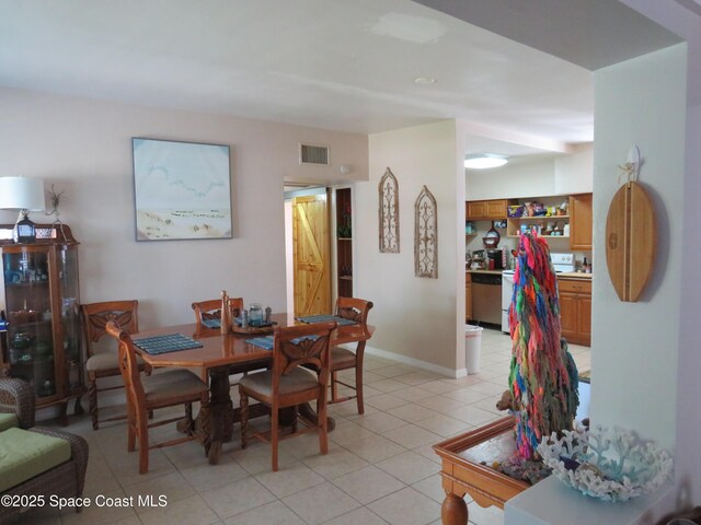 4535 Moon Rd, Titusville, FL 32780 - dining area featuring light tile patterned floors