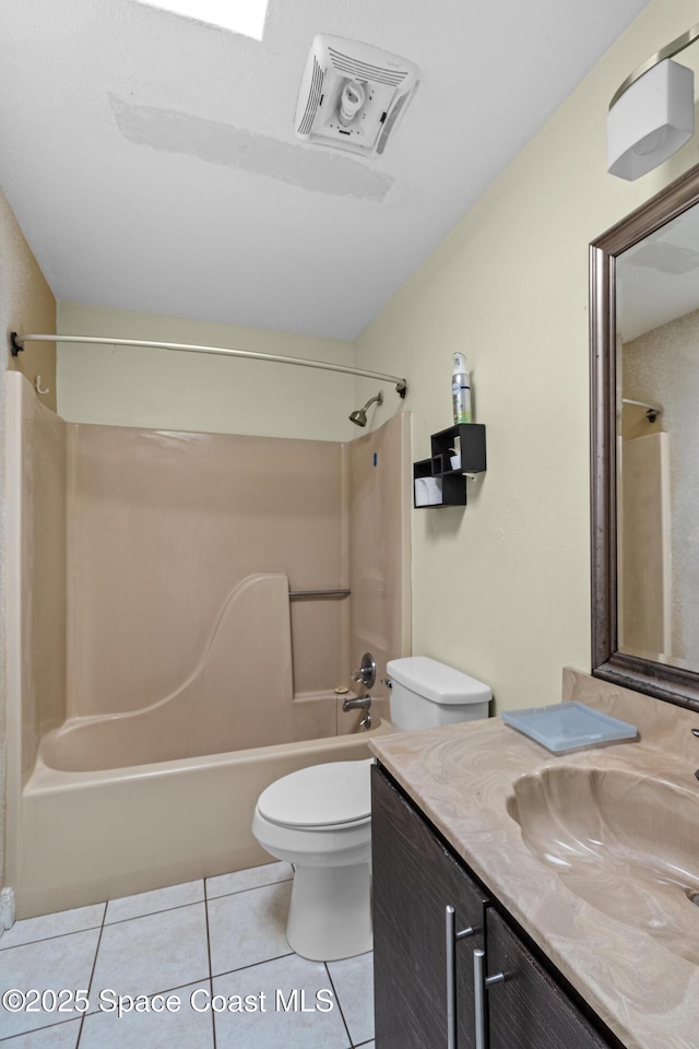 7034 Bayfront Rd, Cocoa, FL 32927 - full bathroom with toilet, tile patterned flooring, bathtub / shower combination, and vanity
