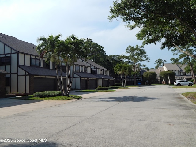 865 Greenwood Manor Cir Unit 5-F, West Melbourne, FL 32904 - view of concrete road with a residential view