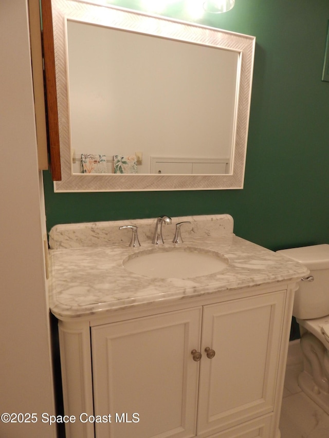 865 Greenwood Manor Cir Unit 5-F, West Melbourne, FL 32904 - bathroom featuring toilet and vanity