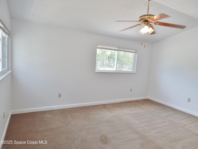 865 Greenwood Manor Cir Unit 5-F, West Melbourne, FL 32904 - unfurnished room with a ceiling fan, baseboards, and carpet