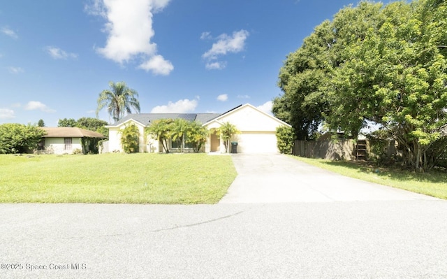 ranch-style house with driveway and an attached garage